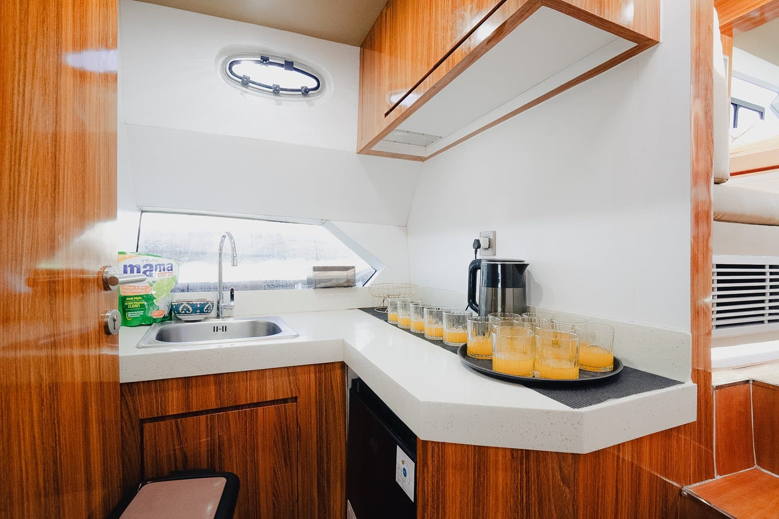 Azure Dream galley kitchen with wood finish