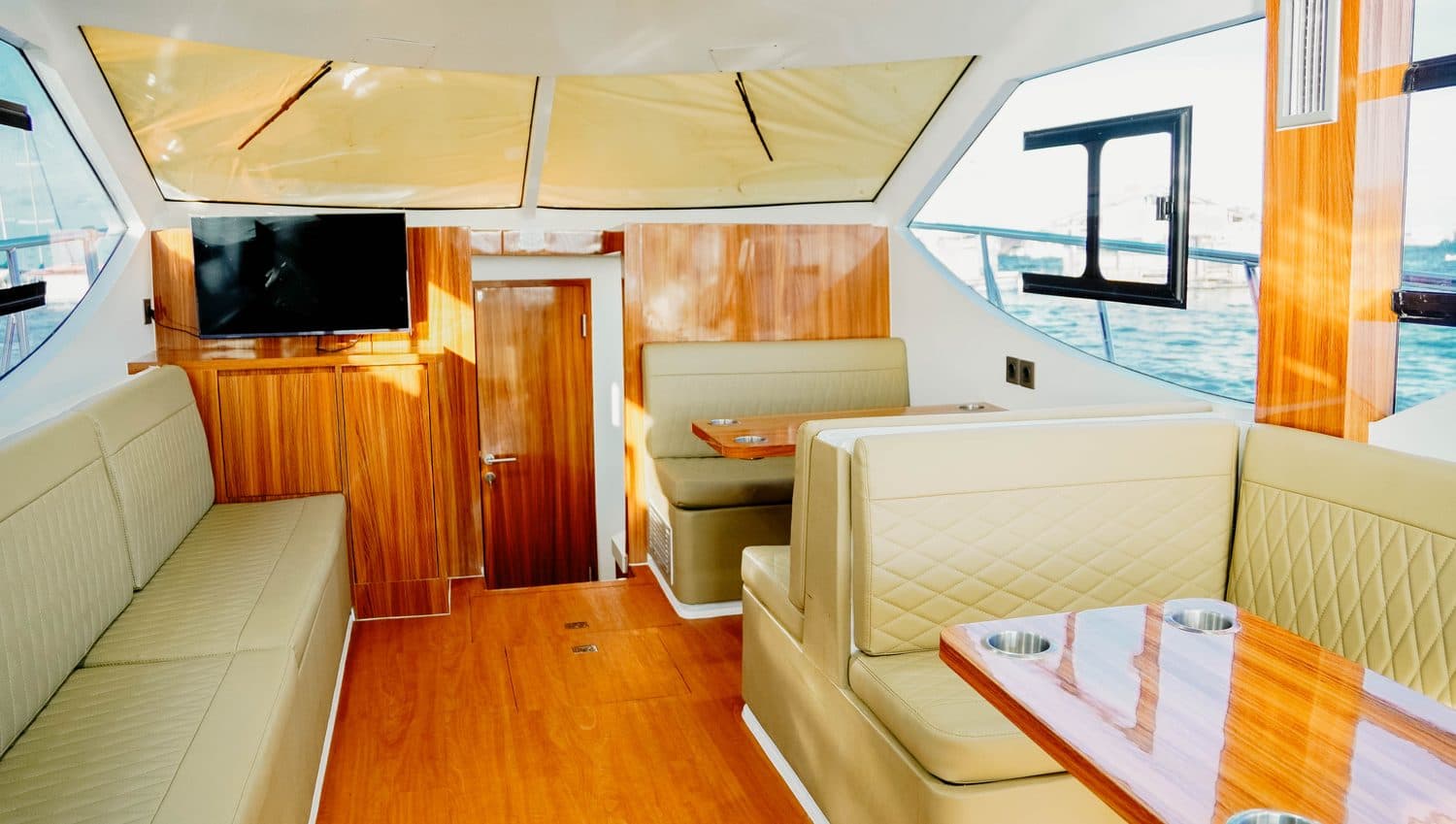 Azure Dream interior lounge with wood finish and cream seating