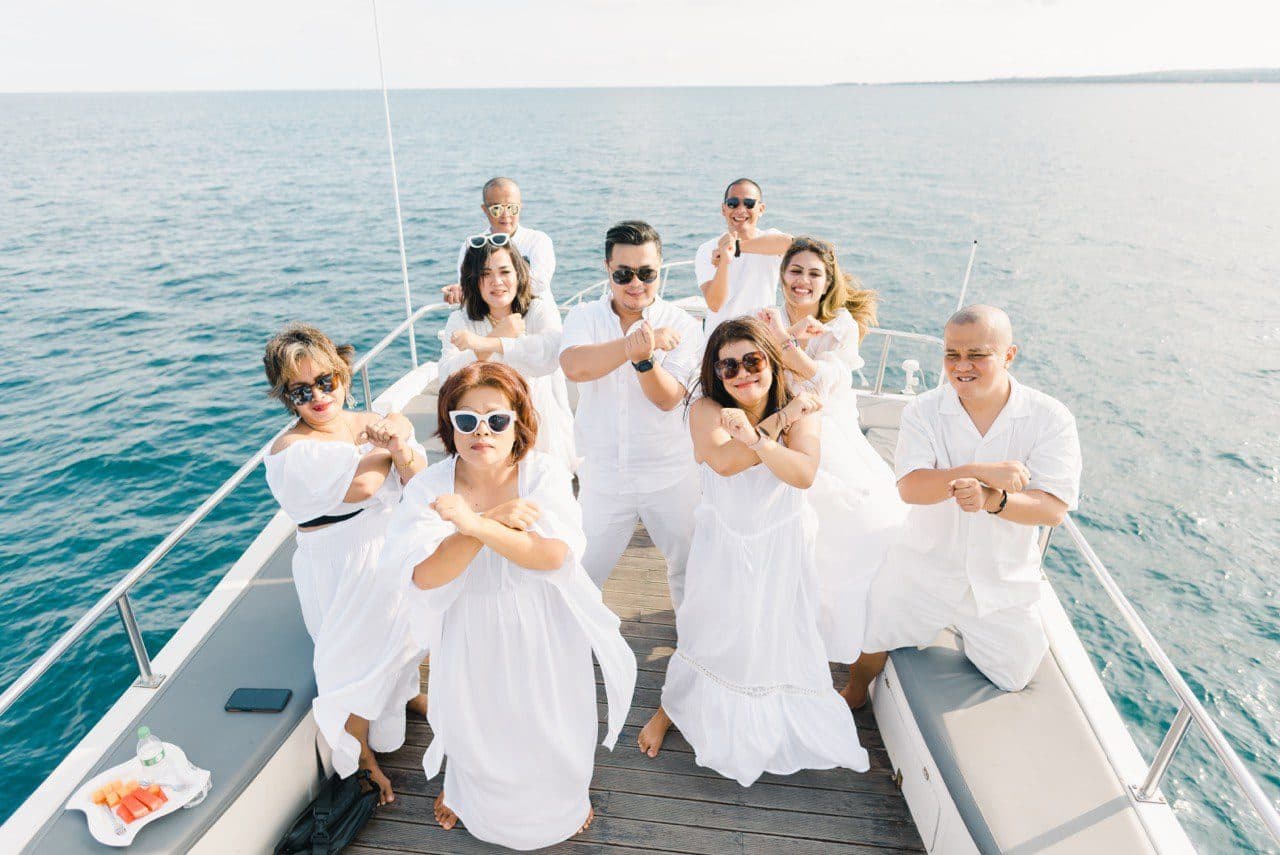 Large group celebration aboard the yacht in Bali