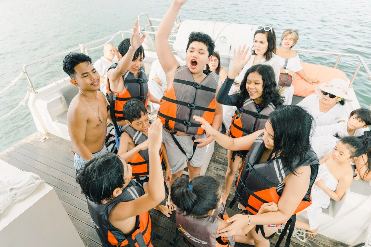 Group cheering before a snorkeling stop at Nusa Penida