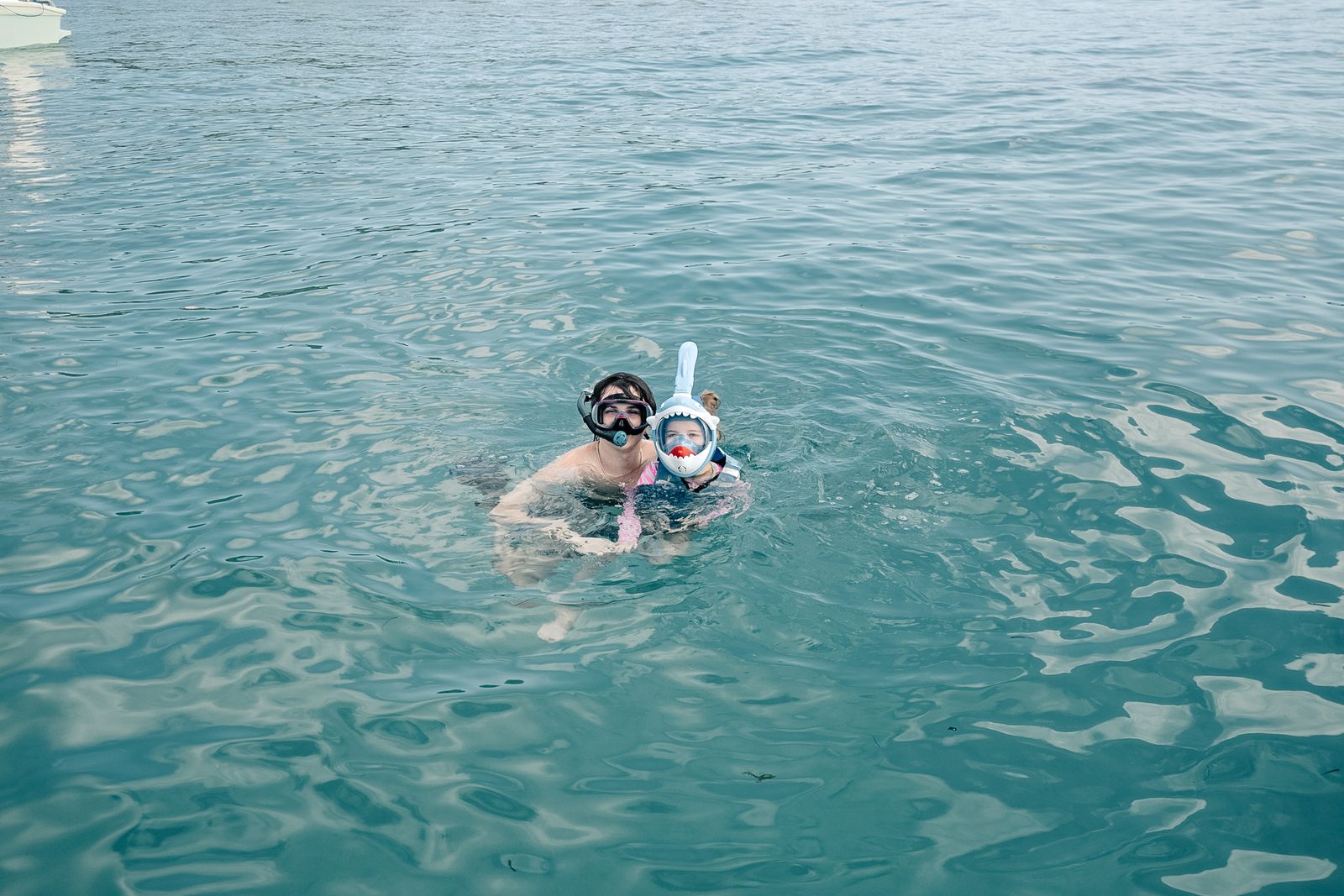 Couple snorkeling together on a private yacht charter in Bali